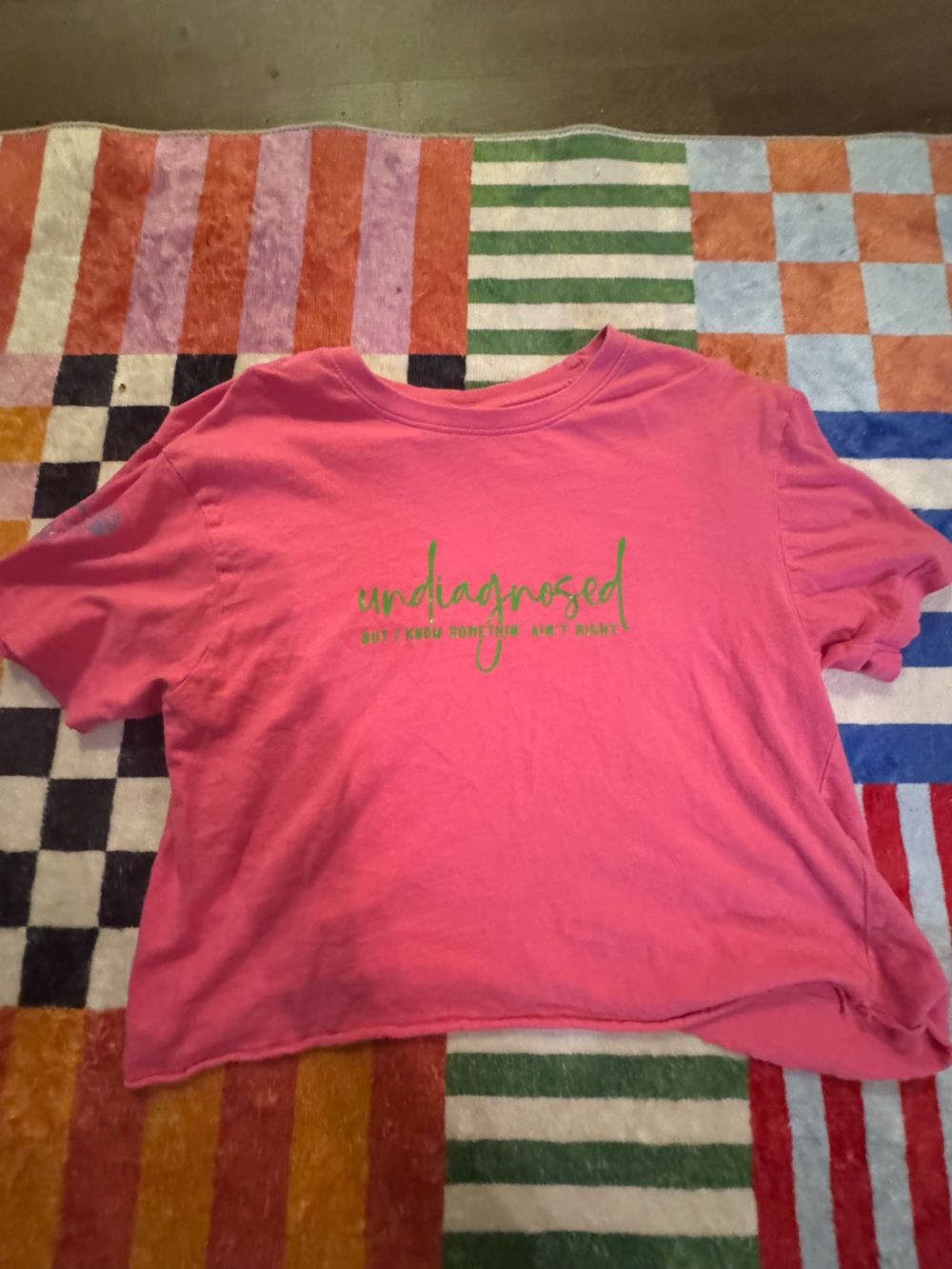 Spirit Pink Tee with Green Script Graphic
